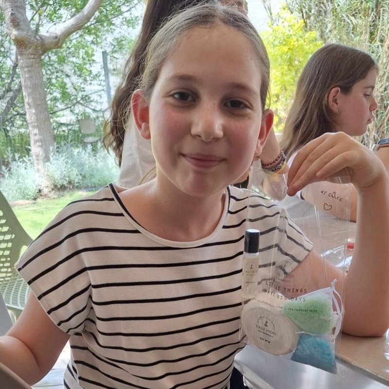 Girl holding spa kit